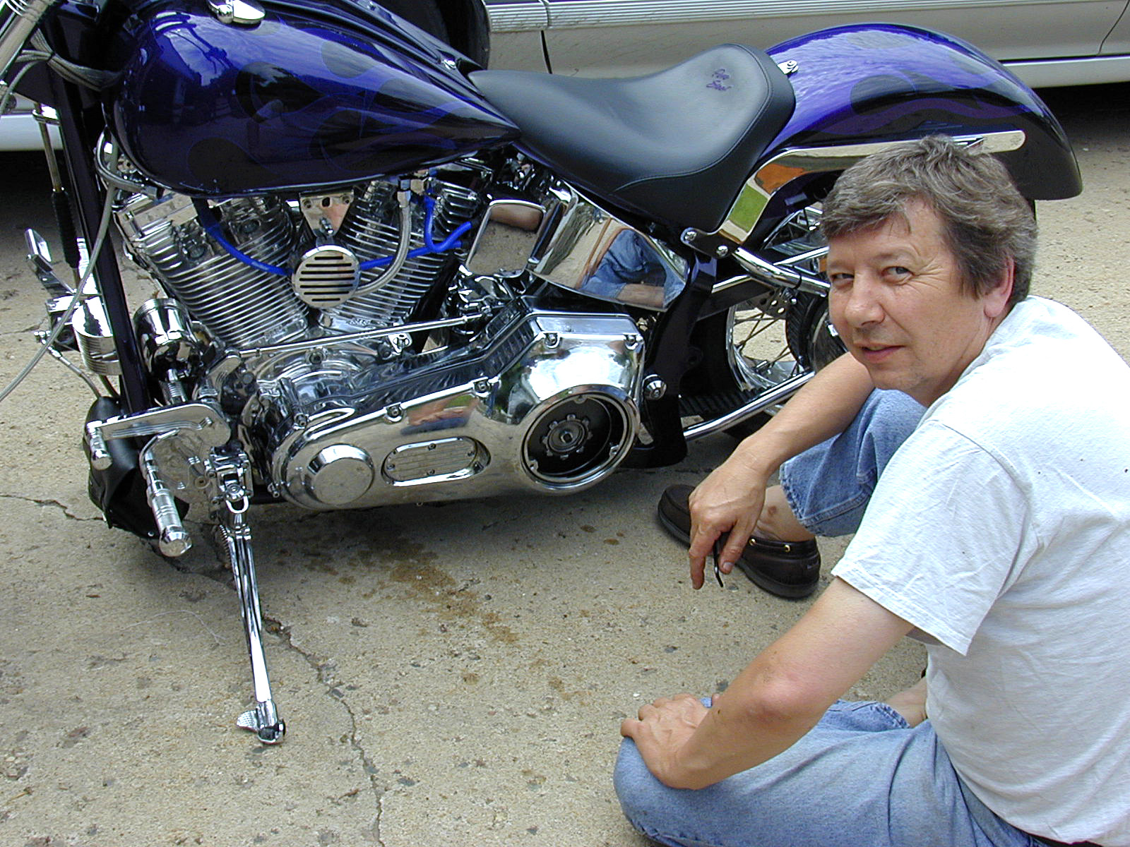 Gary the mechanic, next to his custom motorcycle